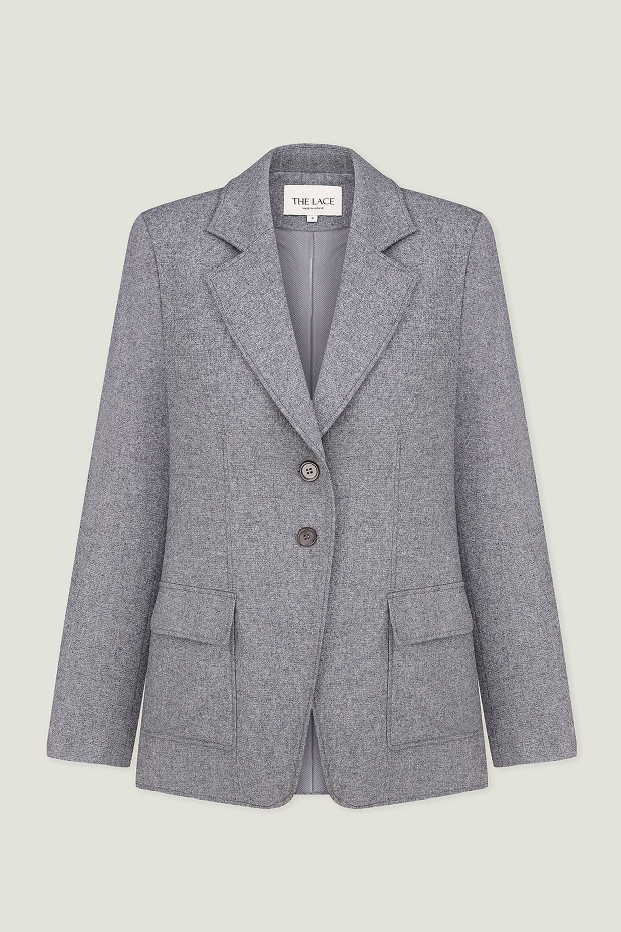 Single-breasted woolen jacket with a tie in gray