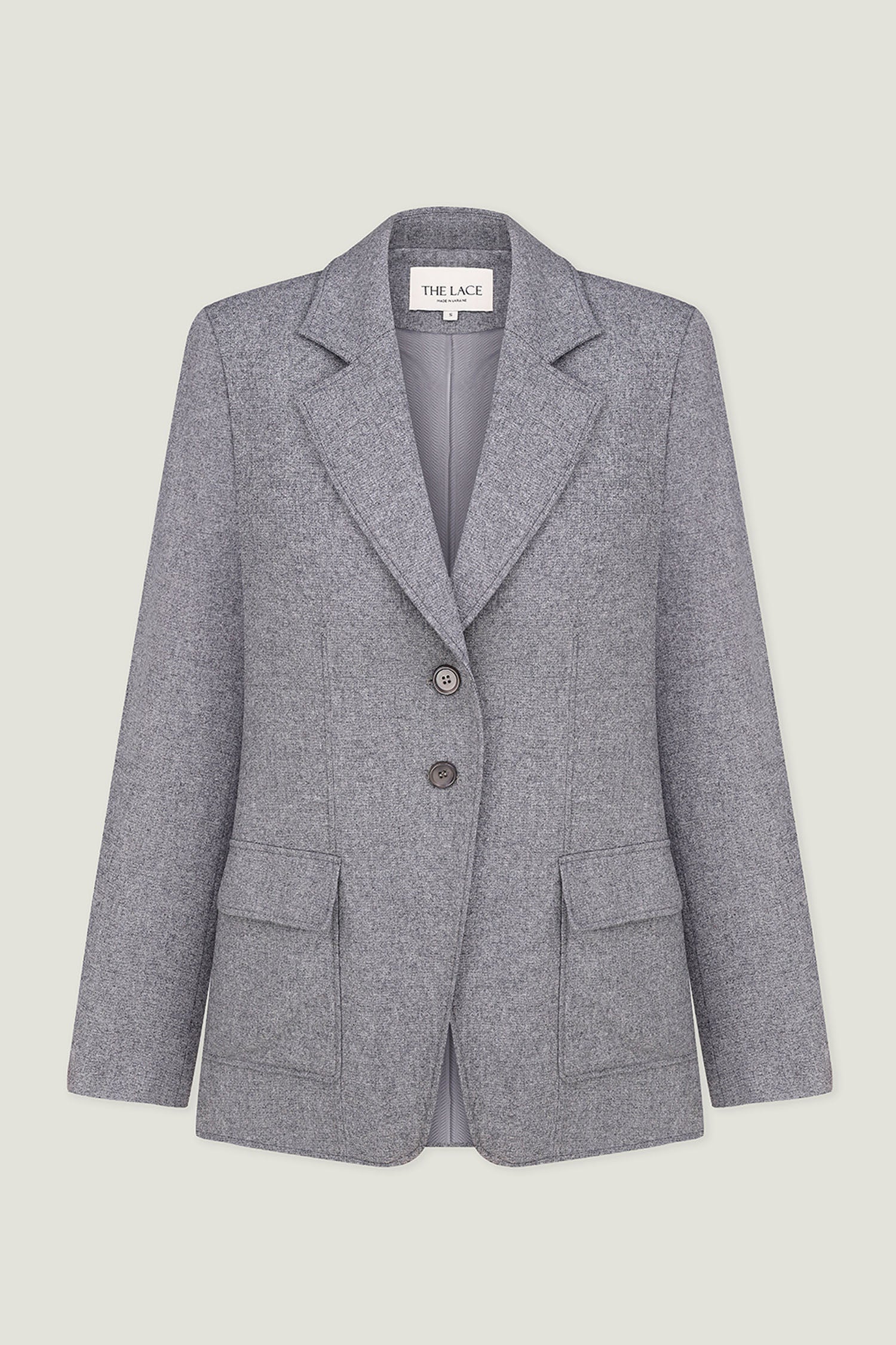 Single-breasted woolen jacket with a tie in gray