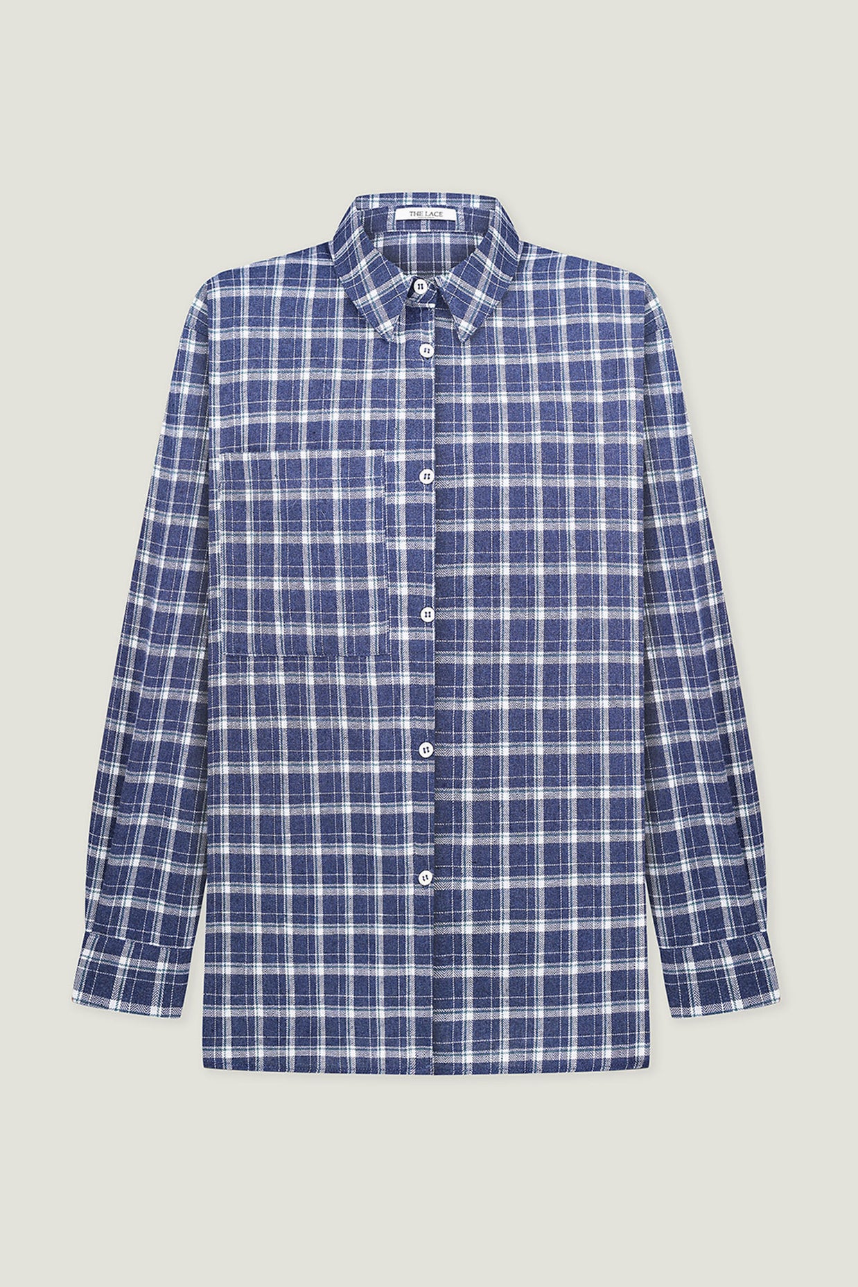 Shirt with a pocket in a beige check dark blue