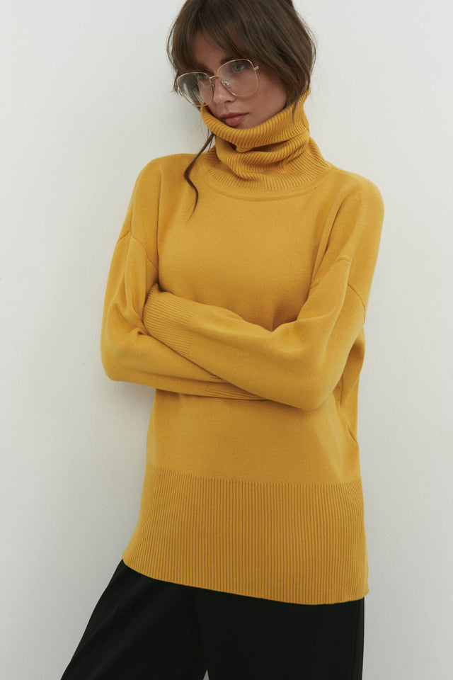 Knitted sweater with a voluminous neck