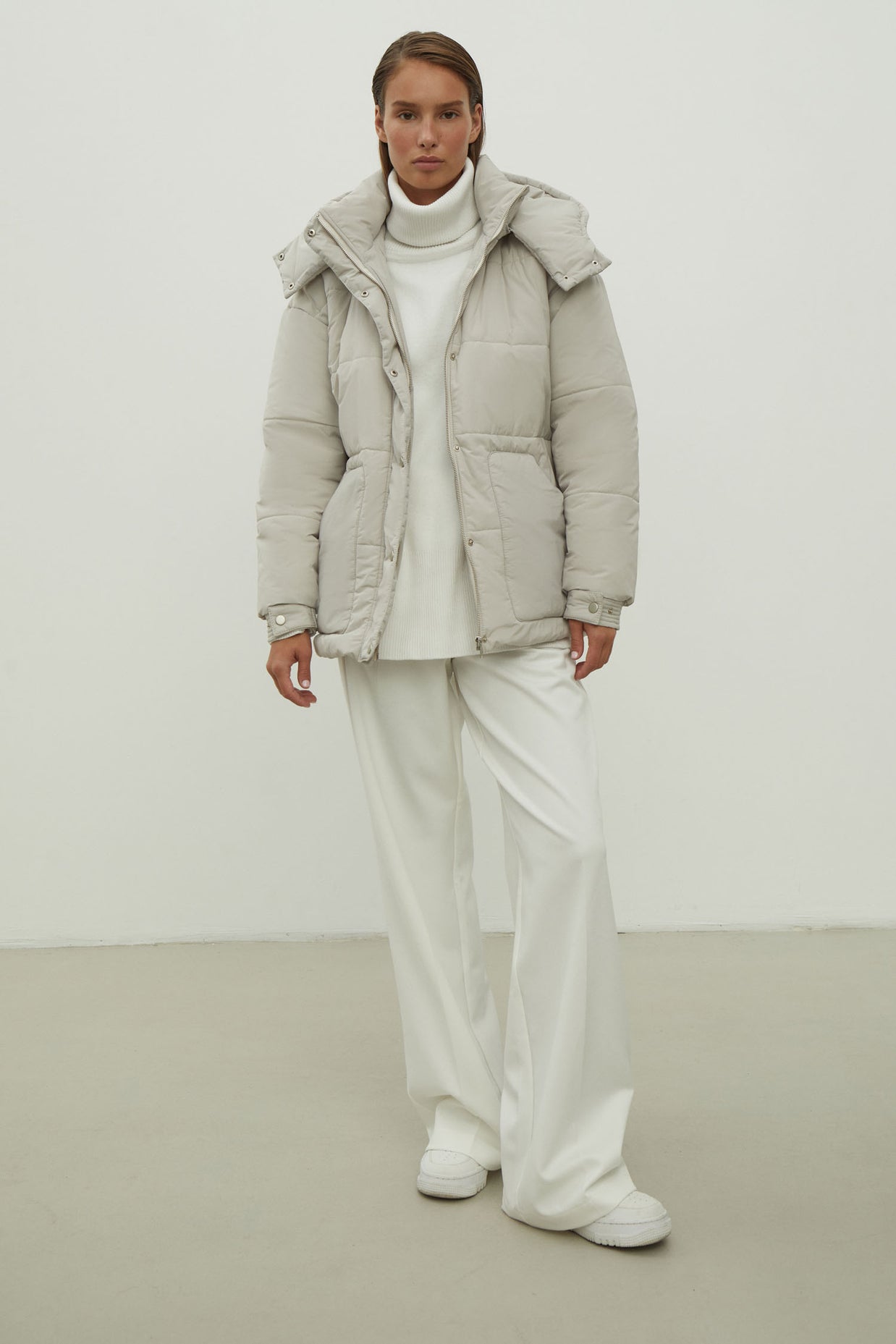Women's jacket with a belt in graphite color