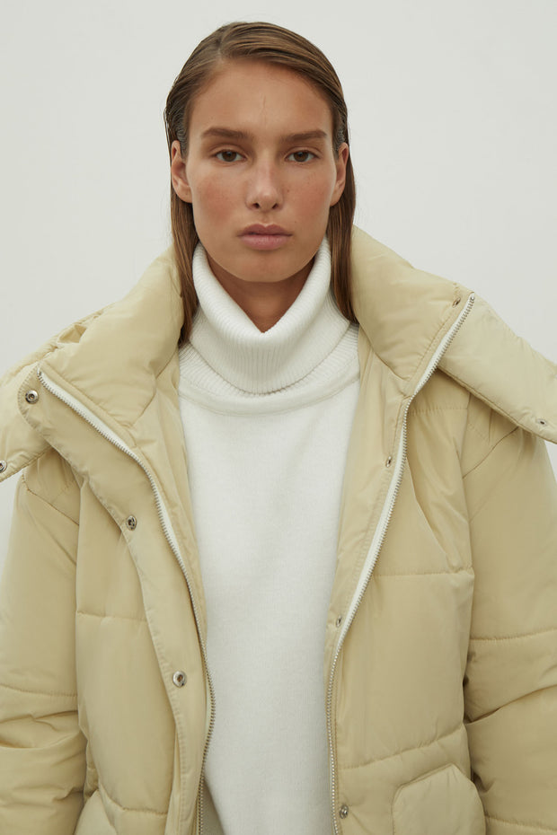 Women's jacket with a belt