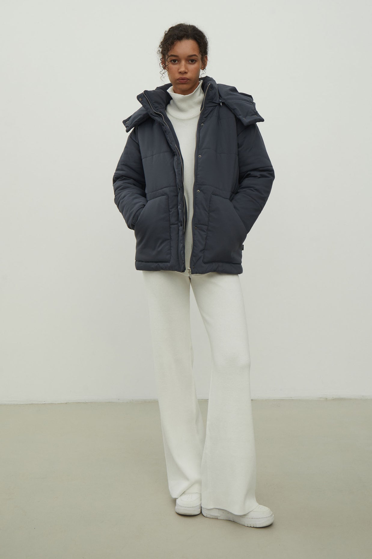 Women's jacket with a belt in graphite color