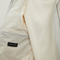 Women's free-cut jacket in light gray color