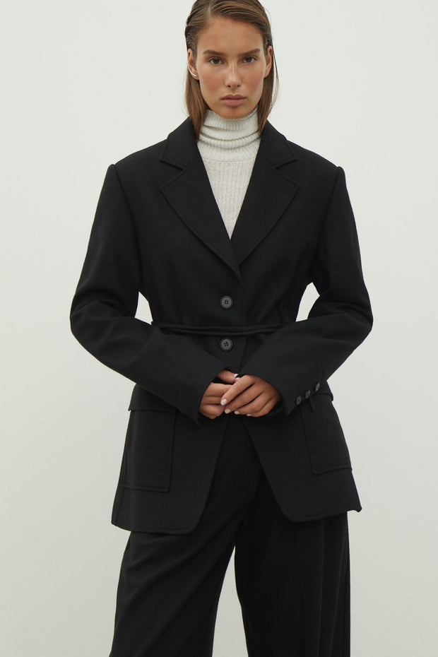 Single-breasted woolen jacket with a tie in gray