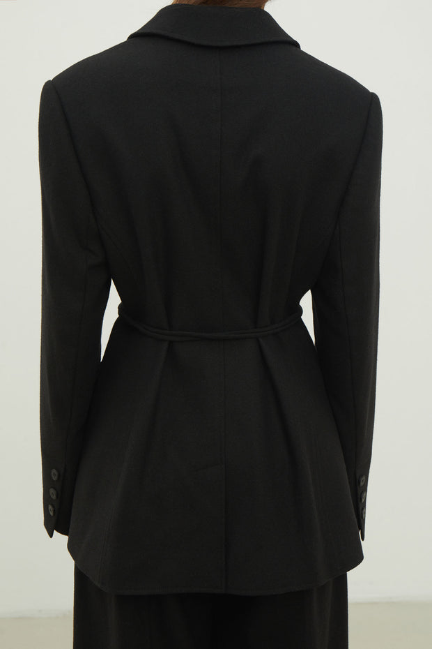 Single-breasted woolen jacket with a tie in gray