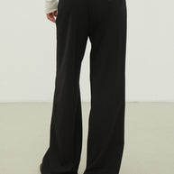 Woolen pants with a tie in black