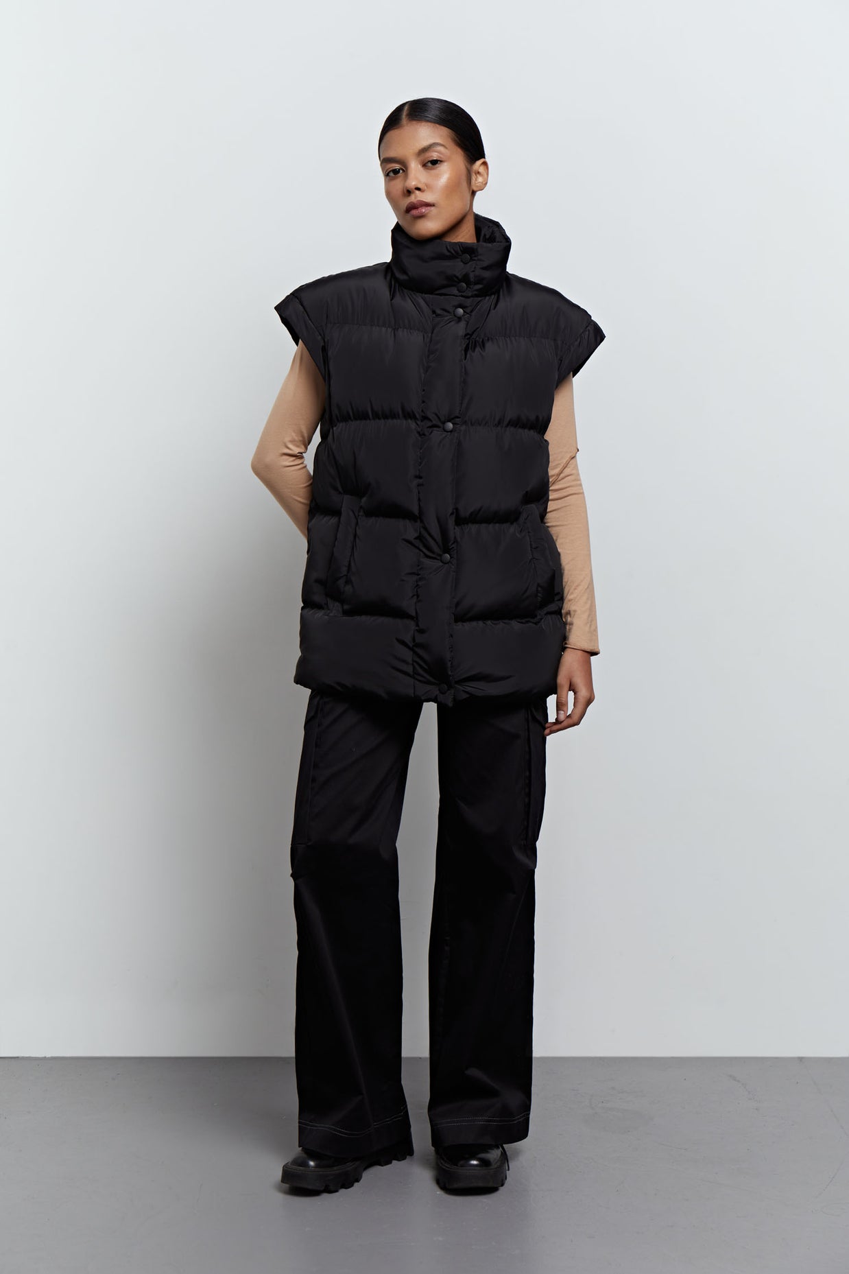 Oversized quilted vest in black