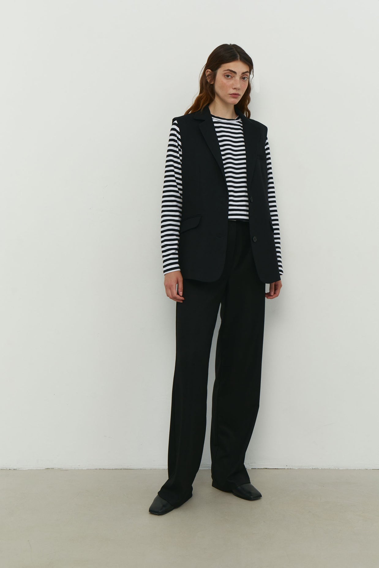 Elongated vest with costume fabric in black