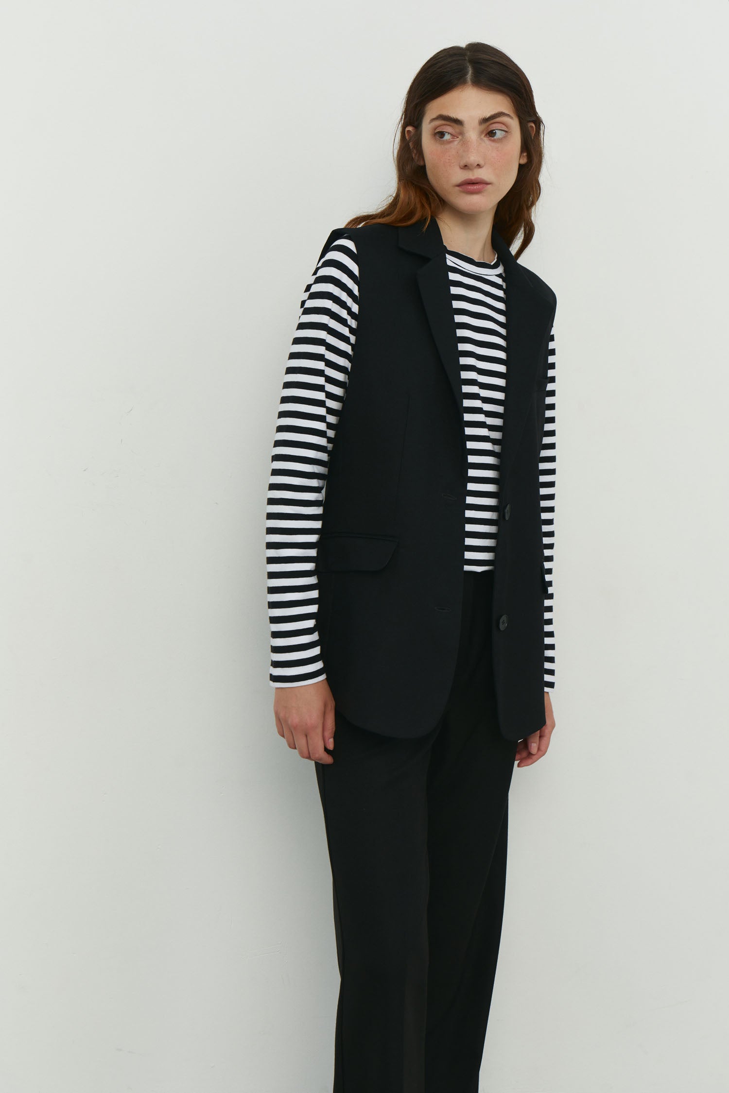 Elongated vest with costume fabric in black