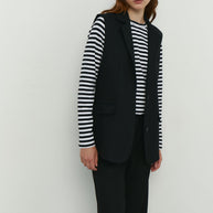 Elongated vest with costume fabric in black