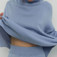Knitted sweater in sky blue/red/nude