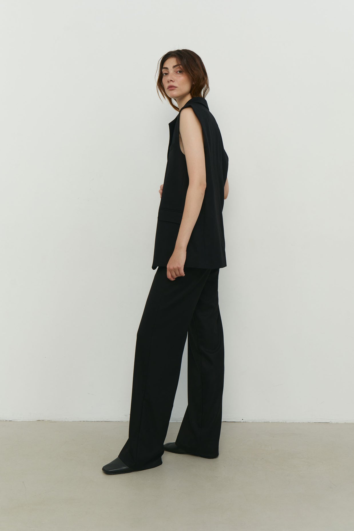 Elongated vest with costume fabric in black