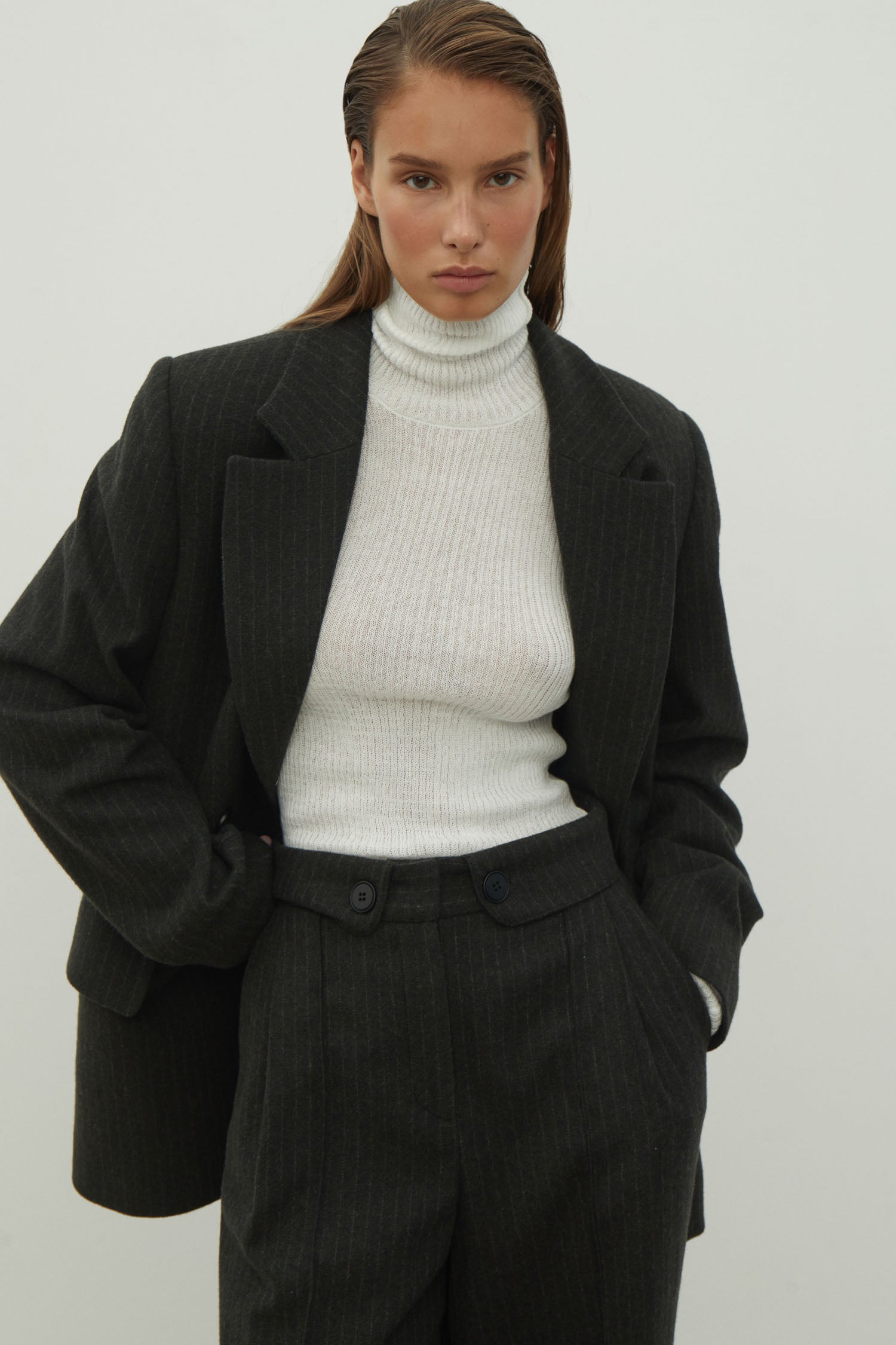 Woolen palazzo pants with a decorated belt in dark gray