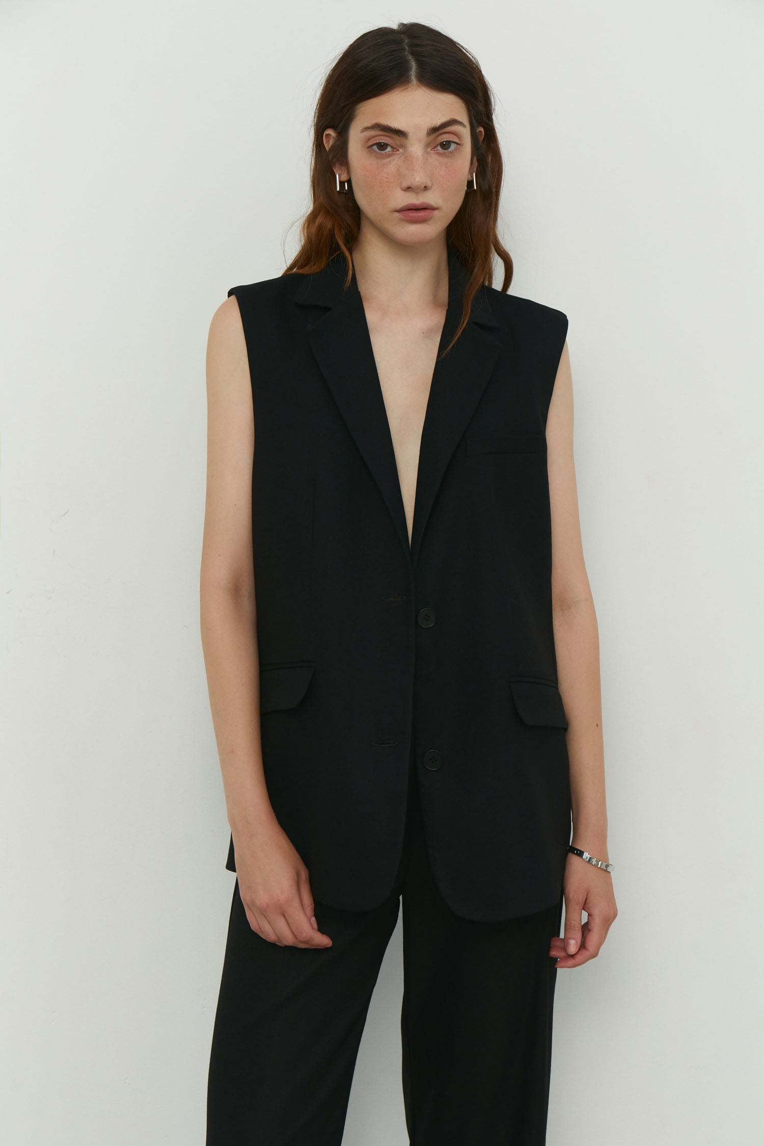 Elongated vest with costume fabric in black