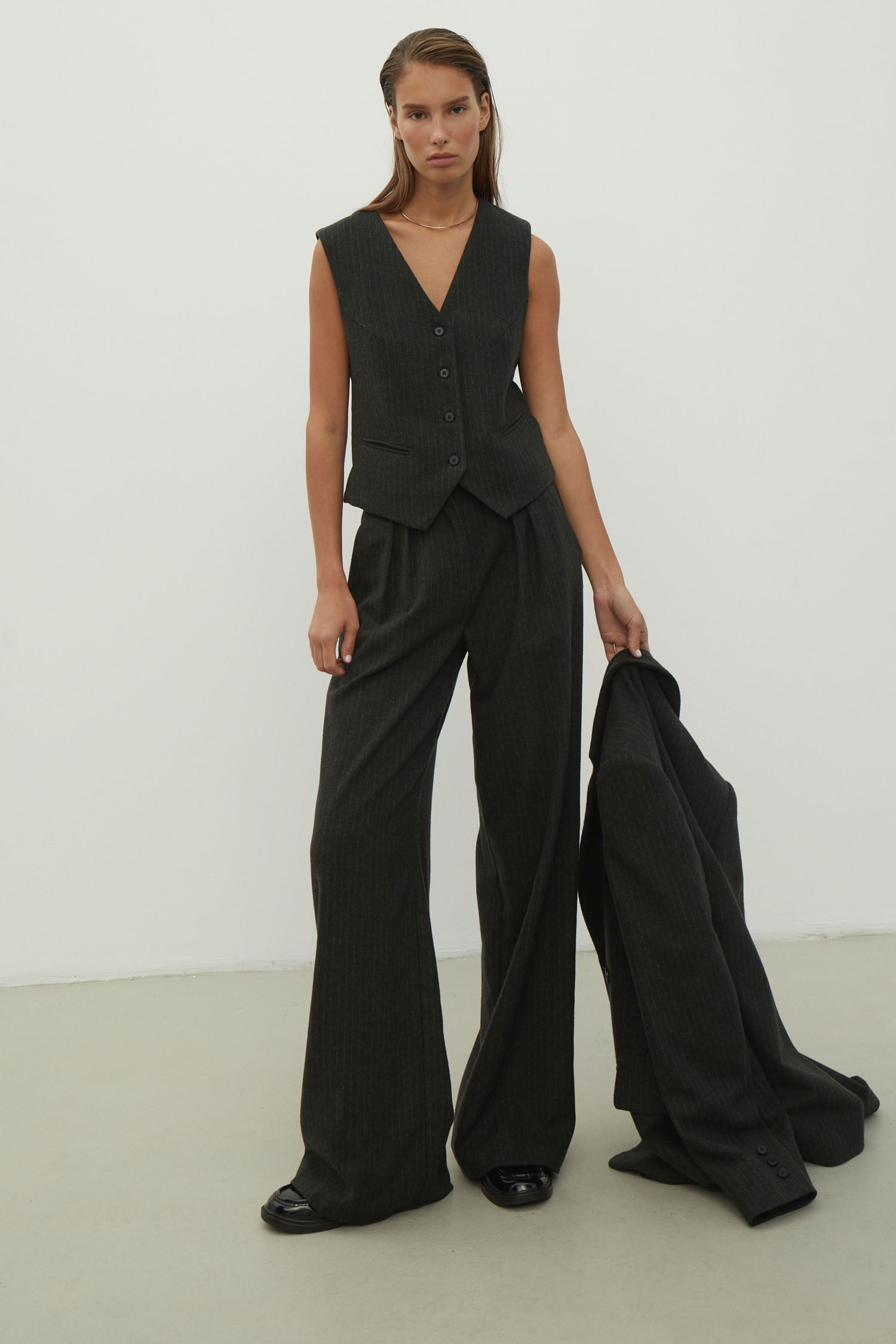Classic woolen vest in a gray-green stripe