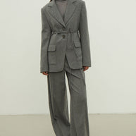 Single-breasted woolen jacket with a tie in gray
