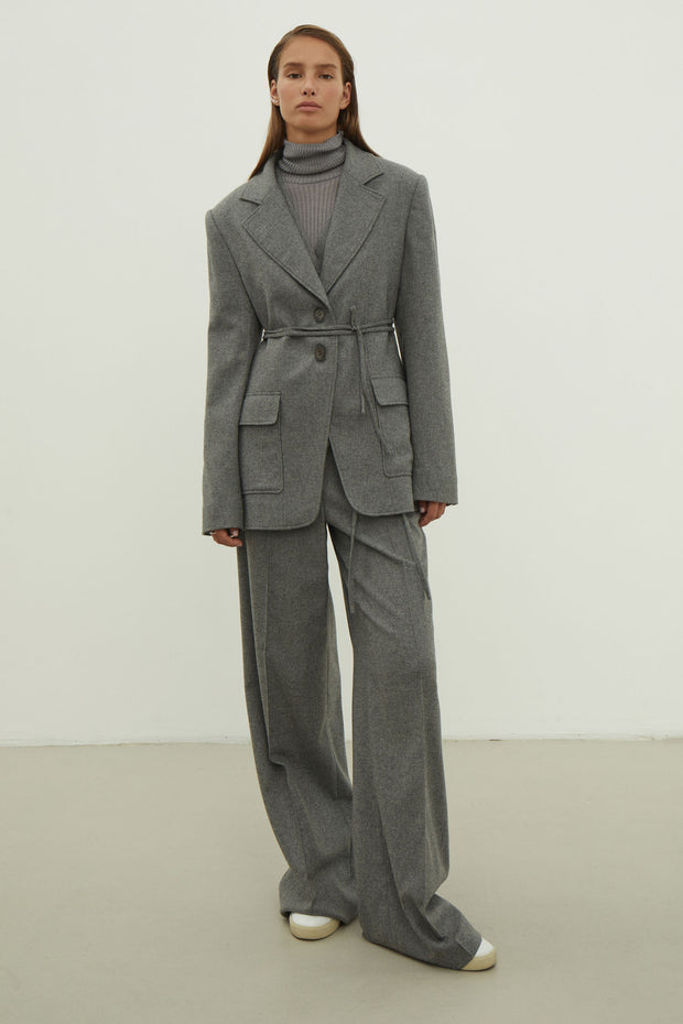 Single-breasted woolen jacket with a tie in gray
