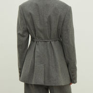 Single-breasted woolen jacket with a tie in gray