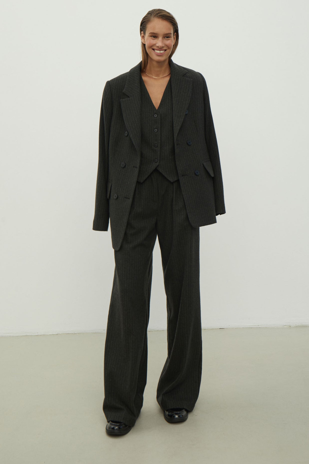 Classic woolen vest in a gray-green stripe