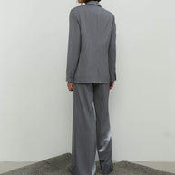 Palazzo pants with double tucks in gray/black