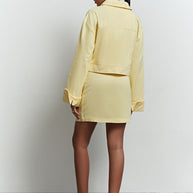 Short cotton jacket in yellow