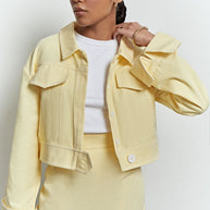 Short cotton jacket in yellow