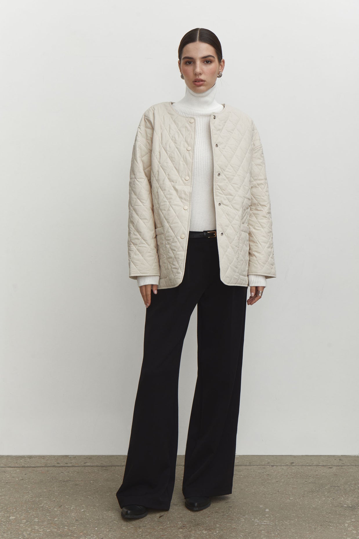 Quilted jacket with a belt