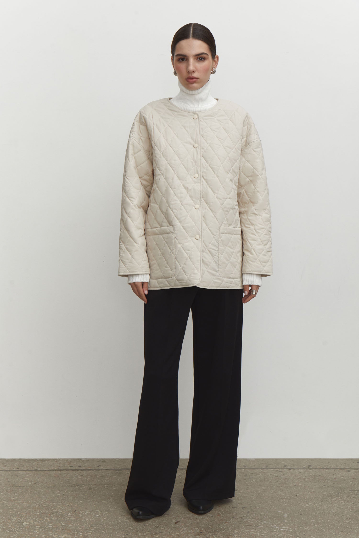 Quilted jacket with a belt