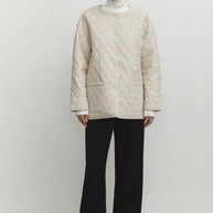 Quilted jacket with a belt