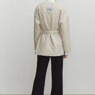 Quilted jacket with a belt