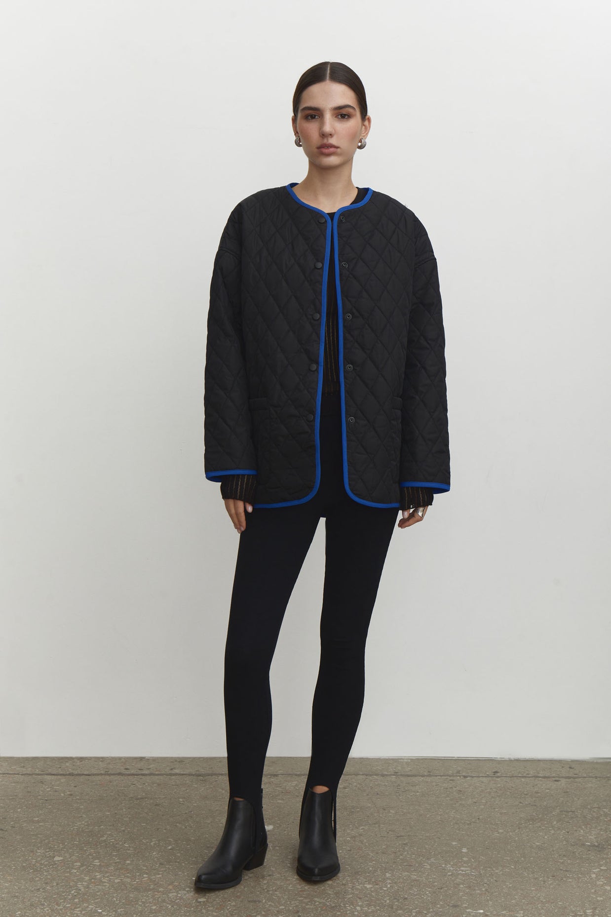 Quilted jacket with a belt