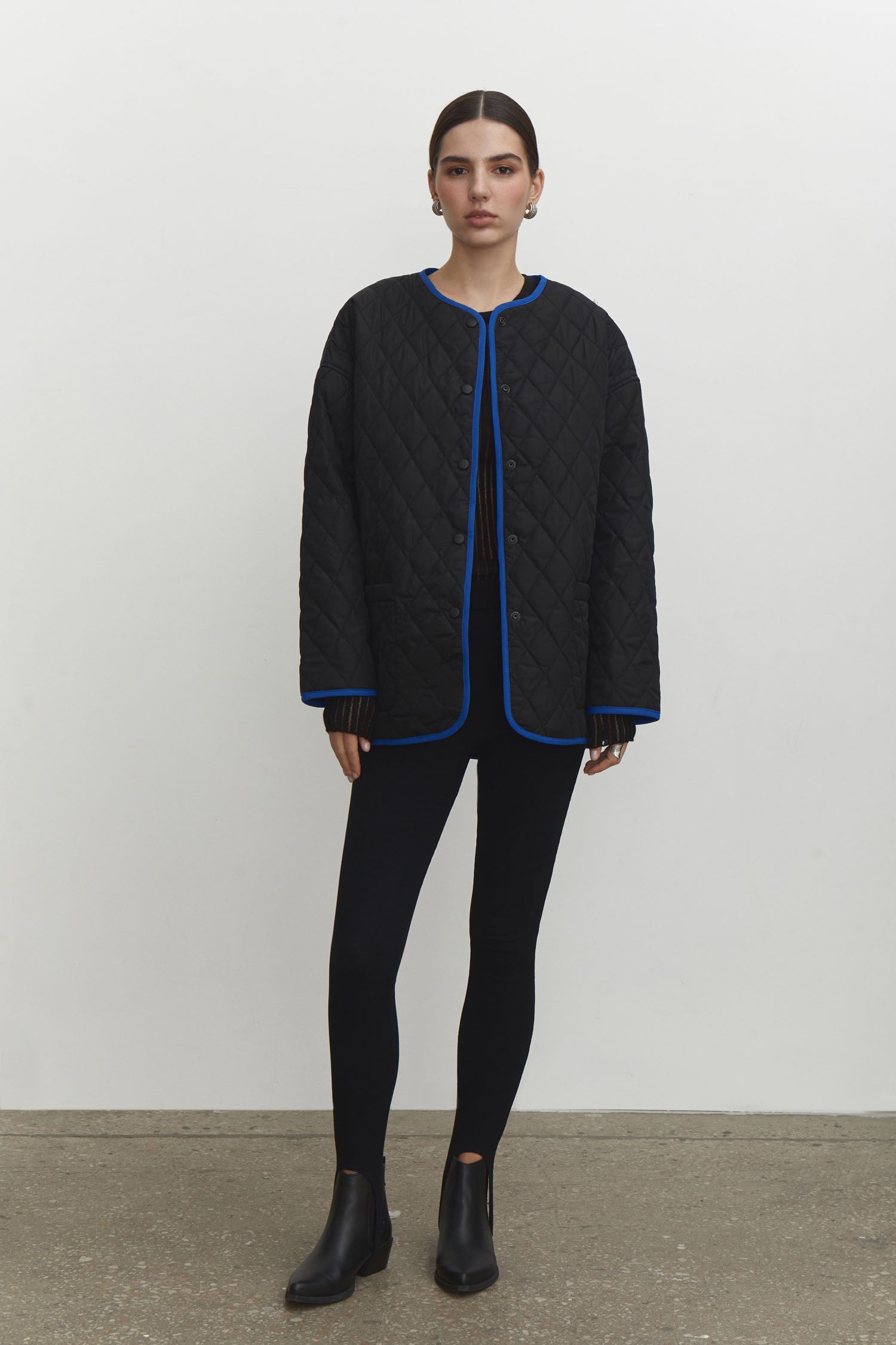 Quilted jacket with a belt