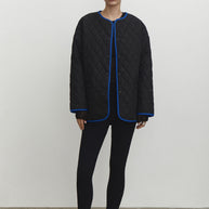 Quilted jacket with a belt