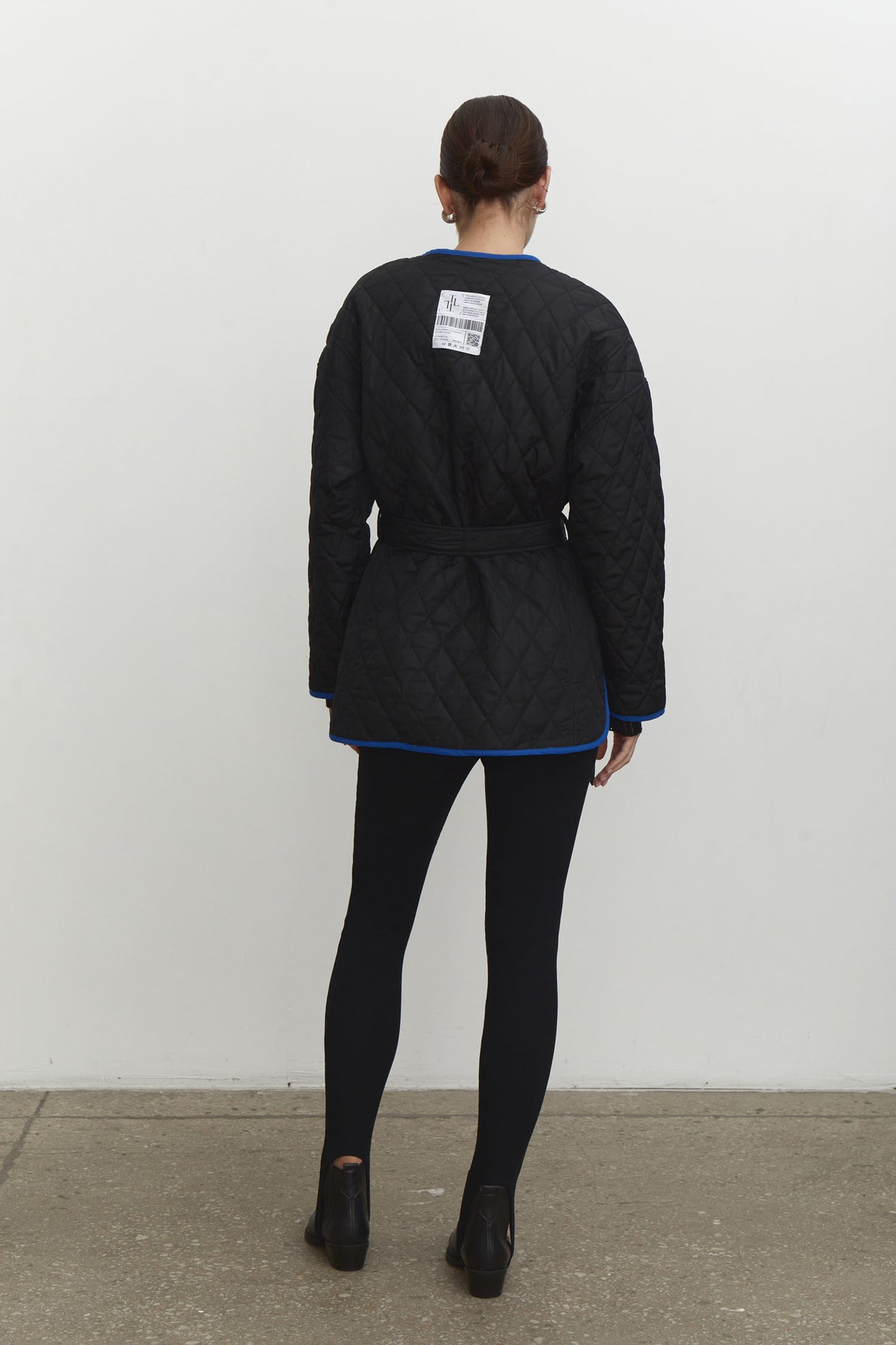 Quilted jacket with a belt