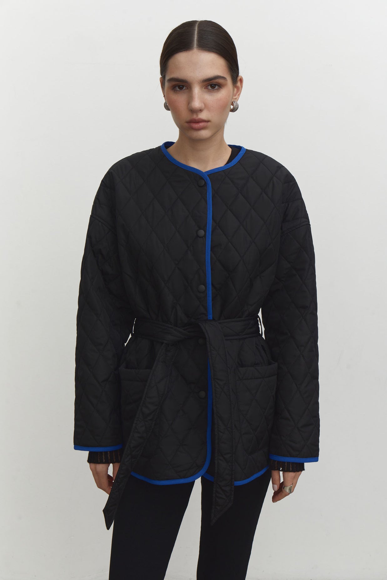 Quilted jacket with a belt