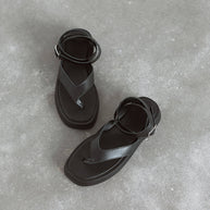 Leather sandals with belt