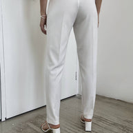 Pants with tucks