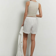 Oversized linen shorts with buttons