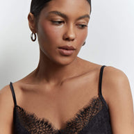 Top with lace decoration