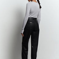Faux leather pants in black
