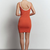 Knitted mini dress with edging in orange/black