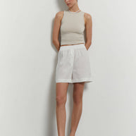 Oversized linen shorts with buttons