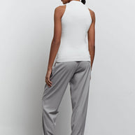 Pants with slanted belt