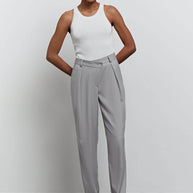 Pants with slanted belt