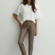 Faux leather pants in cream